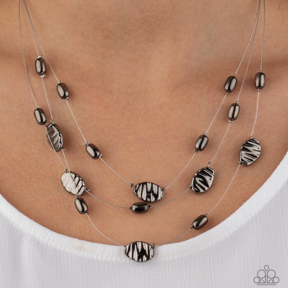 Black necklace  Matching earrings.